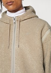 adidas Originals PREMIUM ESSENTIALS - Vinterjakke - beige