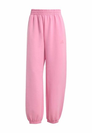 Rosa Adidas-Sweatpants mit elastischem Bund und Bündchen, versehen mit einem dezenten Adidas-Logo am linken Oberschenkel.