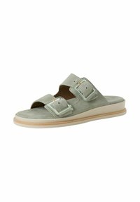Gröna mocka slide-sandaler med två justerbara remmar och klara spännen, med en beige gummisula och öppen tå-design.