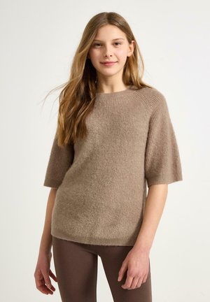 Lysebrun kortærmet strikket sweater med en tekstureret finish. Har rund halsudskæring og en afslappet pasform. Kombineret med mørkebrune leggings.