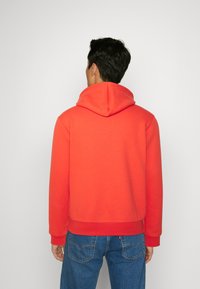 Lacoste Jersey con capucha - watermelon