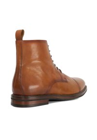 Brown leather ankle boot with a smooth texture, rounded toe, and lace-up design. Features a pull tab and stacked heel for added detail.