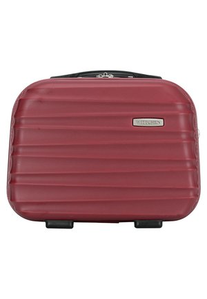 Valigia rigida rossa con texture a righe orizzontali, manico superiore nero e accessori in argento con il logo "WITTCHEN".