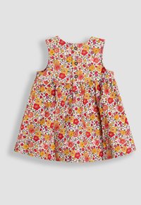 Blumenkleid mit ärmellosem Design, verziert mit gelben, roten und rosa Blumen. Mit geknöpften Rücken, gerafftem Bund, aus Baumwollstoff gefertigt.