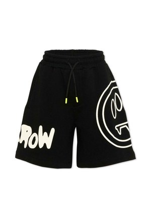 Shorts à taille élastique noire avec cordon de serrage, texte blanc « GROW » sur la jambe gauche et un graphisme de visage en contour blanc sur la jambe droite.