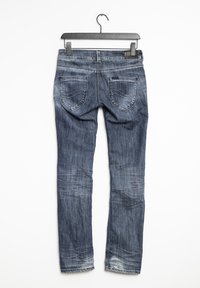 Dark blue denim jeans, featuring a fitted design, five pockets, slight fading at the knees, and double-stitch detailing on the back pockets.