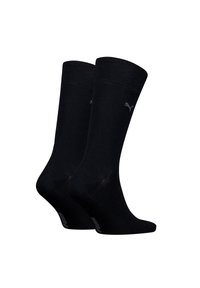 Schwarze Crew-Länge Socken aus Baumwollmischung, mit geripptem Bund, glatter Textur und einem kleinen, grauen Logo an der Seite.