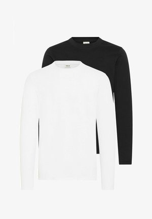 Dve majice z dolgimi rokavi: ena bela in ena črna. Narejene iz mehkega materiala, z okroglimi izrezi in preprostim, minimalističnim dizajnom.