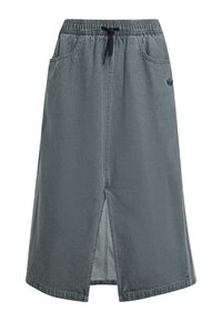 Siva suknja od tkanine s elastičnim pojasom i vrpcom za vezanje. Ima dva bočna džepa i prednju prorez za pokretljivost.