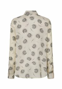 Camicia a maniche lunghe realizzata in tessuto liscio, con uno sfondo crema e un motivo nero a spirale, e polsini con bottoni.