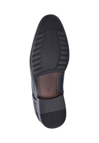 Zwarte leren schoenzool met patroon voor grip, met een gladde, bruine leren accent bij de hak en maatafdruk "42".