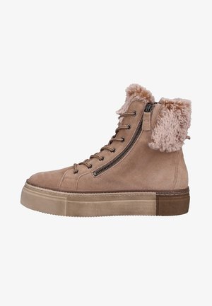 Beige Wildleder Sneaker-Boot mit hohem Schaft, seitlichem Reißverschluss, Schnürung auf der Vorderseite, dicker Gummisohle und plüschigem Futter aus Fell.