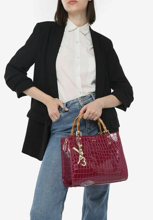 V73 PERLA - Borsa a mano - fuxia