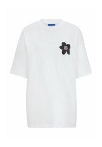 Biała koszulka z krótkim rękawem wykonana z bawełny. Na lewej stronie klatki piersiowej znajduje się czarna grafika kwiatu z uśmiechniętą twarzą. Regularny krój.