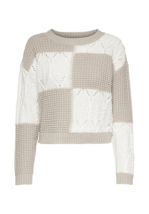 Beige és fehér kötött pulóver rövidített kialakítással. Foltos mintázat, bordás nyaklánc és texturált anyag, amely kábelkötéses részletekkel rendelkezik.