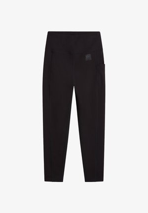 Schwarze Sporthose aus dehnbarem Material mit hohem Bund, seitlichen Taschen und kontrastierenden Nähten.