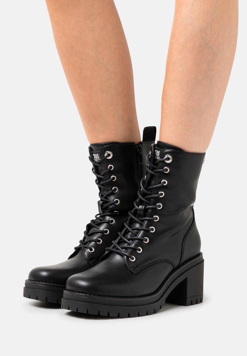 XTI Platform ankle boots black Zalando.de