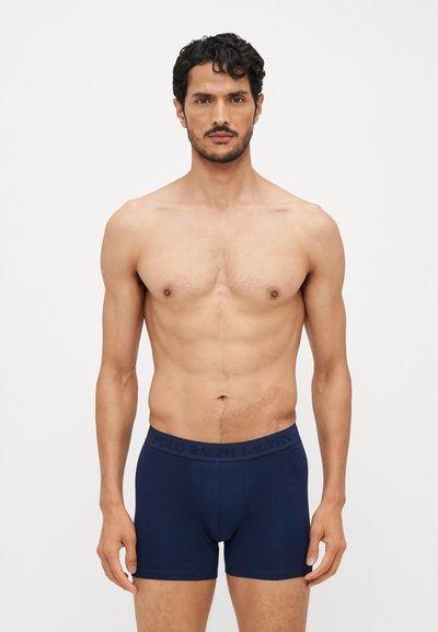 Marineblaue Boxershorts aus weichem Material mit einem Logo-verzierten Bund. Entworfen für Komfort mit einer figurbetonten Passform.