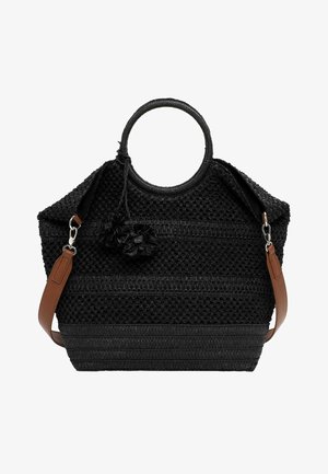 Musta kudottu olkalaukku pyöreillä kahvoilla, ruskeilla irrotettavilla olkahihnoilla ja kahdella mustalla tupsunauhalla, jotka roikkuvat yhdestä kahvasta.