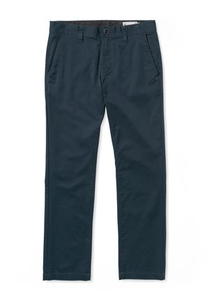 Navy chinos made of cotton blend fabric, featuring a standard fit, front pockets, and a button closure with a zip fly.