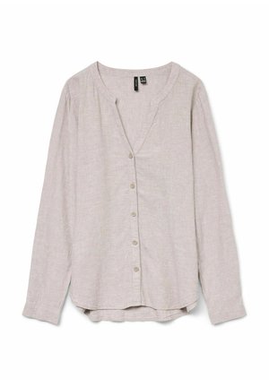 Ljus beige linneskjorta med långa ärmar, v-ringning, knappstängning fram och rundad nederkant. Har en texturerad tyg och subtil lyster.