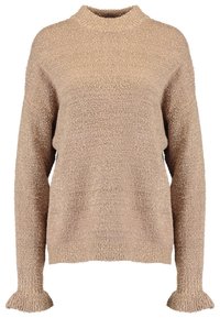 Pull beige en tricot avec un col montant, des manches longues et des poignets à volants. La texture est douce et duveteuse, créant une apparence chaleureuse.