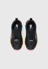 Black athletic shoes with a mesh upper, featuring colorful rubber accents in pink, blue, yellow, and orange along the soles.