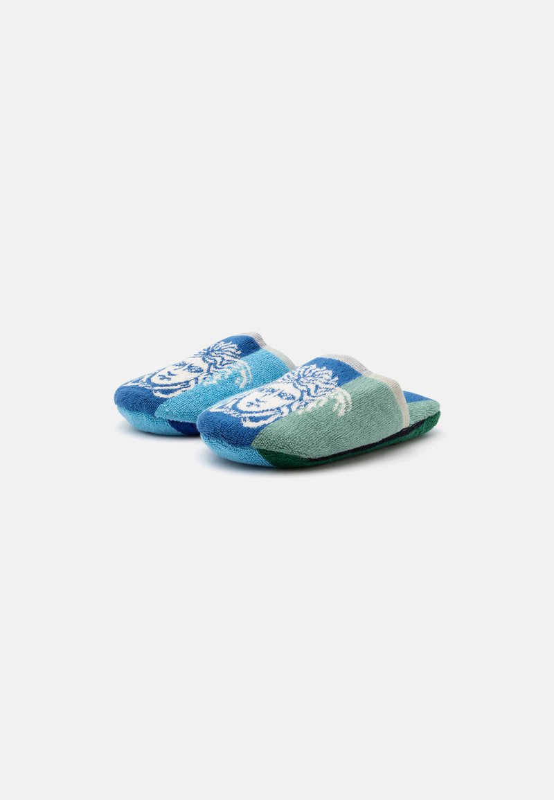 Pair of blue and green soft fabric slippers with a white floral pattern on the front, shown from a side angle on a white background.