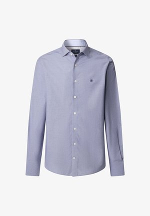 Svijetloplava košulja dugih rukava s dugim rukavima, s ovratnikom, bijelim gumbima i malim izvezenim logom na lijevoj strani prsnog koša.