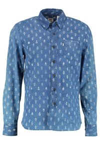 Lichtblauwe, lange mouwen overhemd van denim, voorzien van een subtiel wit bloemenpatroon, knoopsluiting en borstzak.