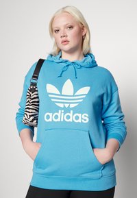 adidas Originals Mikina s kapucí - app sky rush