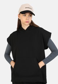 Modanisa BENIN SET - Maxi sukně - black