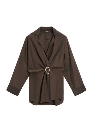 Brown button-up shirt with a spread collar, front knot detail, and a decorative brooch. Features long sleeves and a relaxed fit.