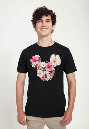Zwarte katoenen T-shirt met een bloemen Mickey Mouse silhouet ontwerp, versierd met roze en witte hibiscus bloemen en groene bladeren.