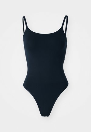 Bañador negro de una sola pieza con tirantes finos ajustables, textura suave, aberturas de pierna altas y diseño minimalista. Adecuado para trajes de baño.