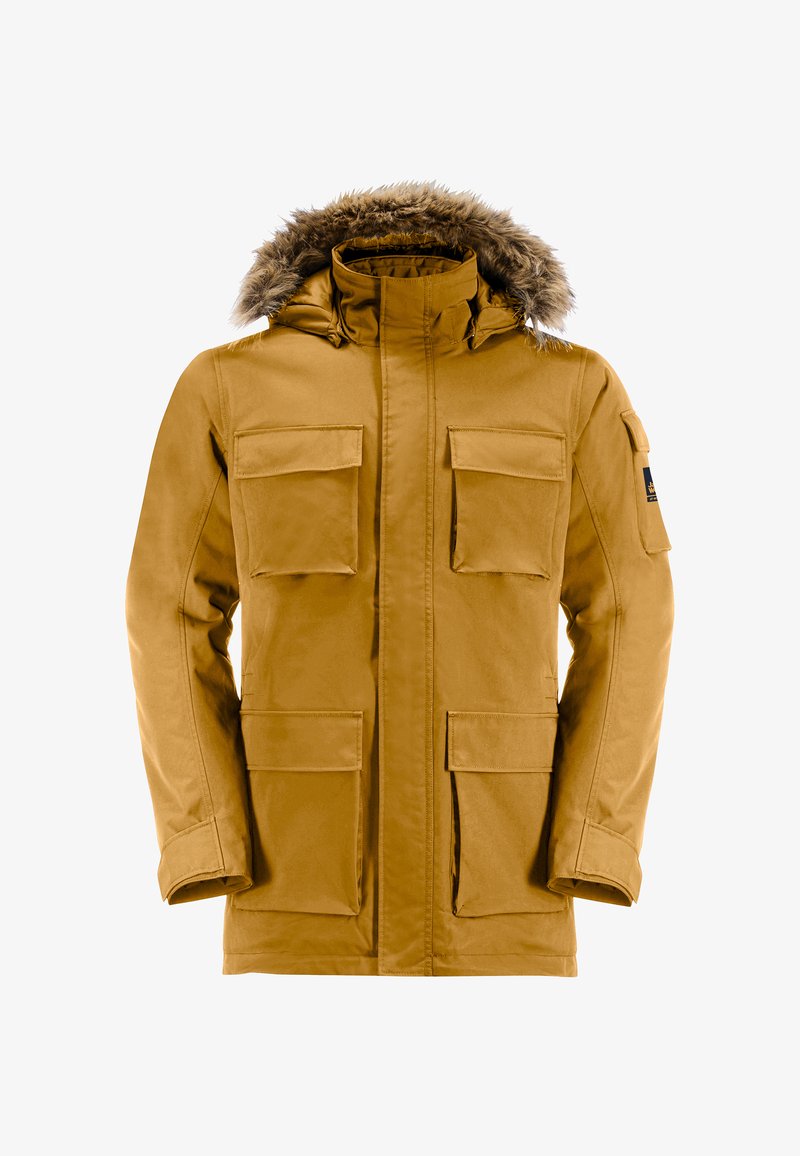 Parka giallo-marrone con cappuccio bordato in pelliccia, zip frontale e numerose tasche a pattina sul petto e sui lati inferiori. Tessuto con superficie liscia.