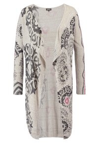 Lange, open voor cardigan in beige met zwart en roze bloemenpatronen. Gemaakt van een gestructureerde brei, met 3/4 mouwen en geribbelde manchetten.