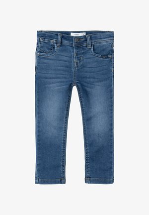 Denim jeans v srednje modri barvi s klasičnim krojem, petimi žepi in kontrastnim šivom. Imajo sprednje zapiranje na gumb in zanke za pas.