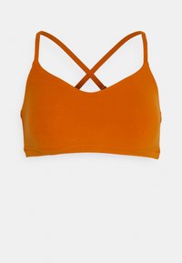 Bralette laranja com uma textura suave, apresentando um decote em V e alças cruzadas nas costas. Design simples e construção sem costuras.
