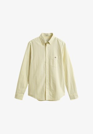 Long-sleeve pale yellow shirt with thin blue vertical stripes, buttoned front, chest pocket with small logo, and button-down collar.