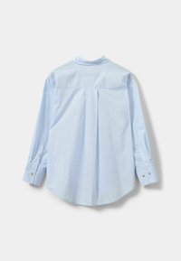 Nööpidega pluus - light blue