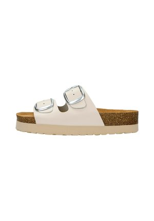 Sandales blanches avec deux boucles en argent, semelle intérieure texturée en liège et une épaisse semelle en caoutchouc beige. Matériau lisse et design à bout ouvert.