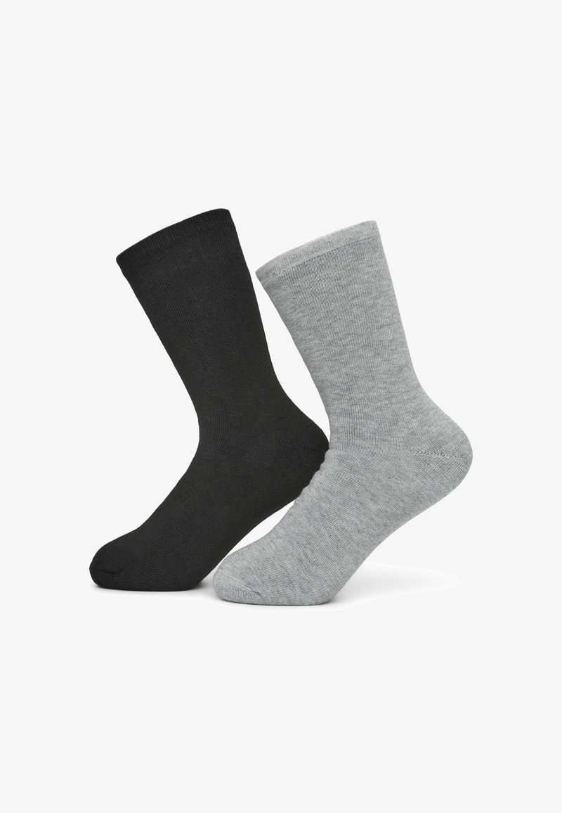 Calzini in cotone neri e grigi, lunghezza fino al polpaccio, con texture a coste, dotati di punta e tallone rinforzati. Design semplice, senza loghi visibili.