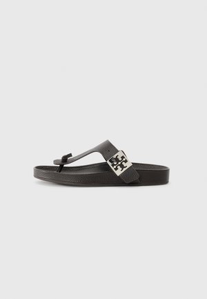 Flip-flop din piele neagră, cu un suport texturat pentru picior, curea subțire și accent cu logo argintiu pe lateral. Talpă plată concepută pentru confort.
