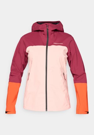 Damesjas met een kastanje bovenkant, een roze lichaamsdeel en oranje mouwen. Heeft een rits aan de voorkant en een capuchon, gemaakt van een lichtgewicht, waterproof materiaal.