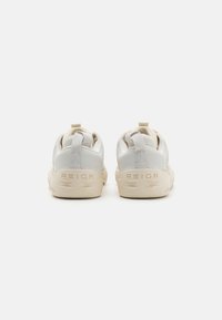 Under Armour REIGN 6 - Chaussures fitness - ivory dune/stone/white