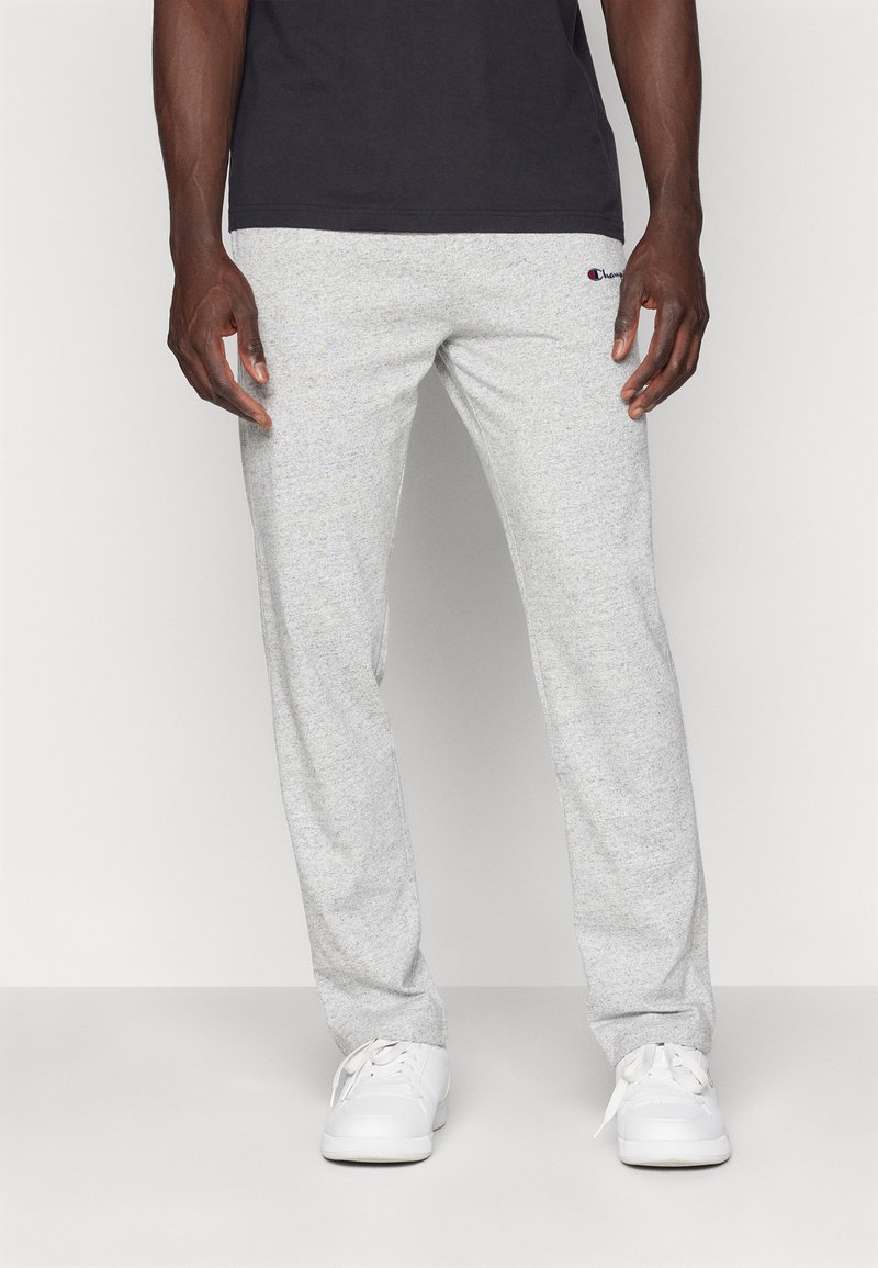 Graue Heather-Sweatpants aus weichem Material, mit elastischem Bund und kleinem Logo an der linken Hüfte, gestaltet für Komfort und Bequemlichkeit.