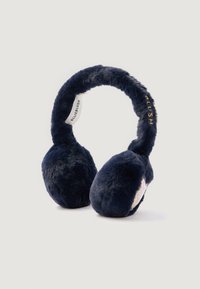 Cuffie in tessuto morbido e peloso di colore blu navy. Presentano un'archetto imbottito e accenti iridescenti sui padiglioni auricolari, etichettati "BILLIEBLUSH".