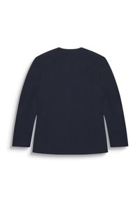 Giacca tagliata di colore blu navy dal design elegante, con maniche lunghe e senza chiusure visibili. Texture liscia, stile minimalista e forma strutturata.