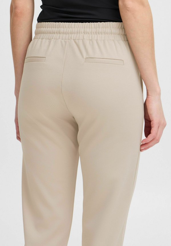 KATE - Tracksuit bottoms - string2